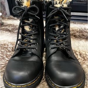 Really cute pair of Dr. Martens fur lined boots.  Size 6M 7L